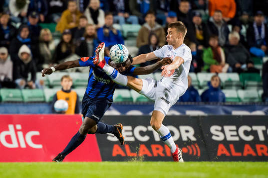 Franck Boli of Stabæk and Øyvind Alseth of Ranheim