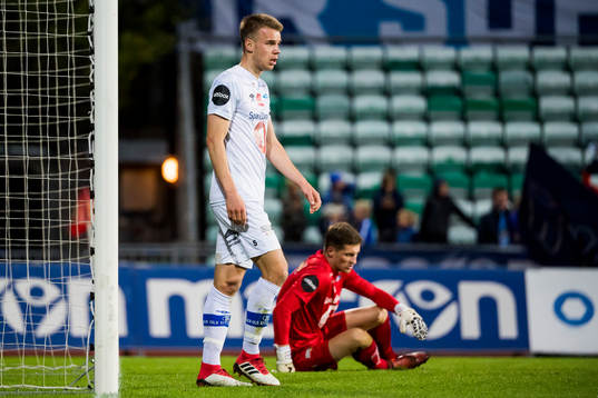 Øyvind Alseth and goalkeeper Even Barli of Ranheim look