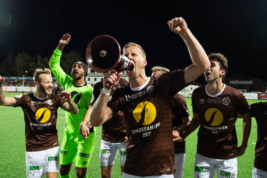 Joackim Solberg of Mjøndalen celebrates with team mates