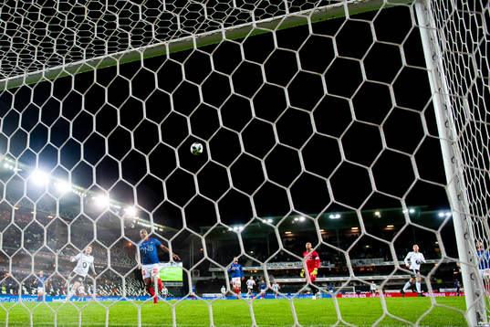 Djordje Denic of Rosenborg scores the 1-0 goal behind