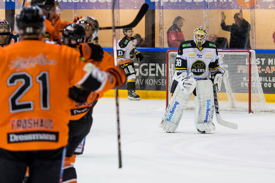 Goaltender Henrik Holm of Stavanger Oilers looks dejected