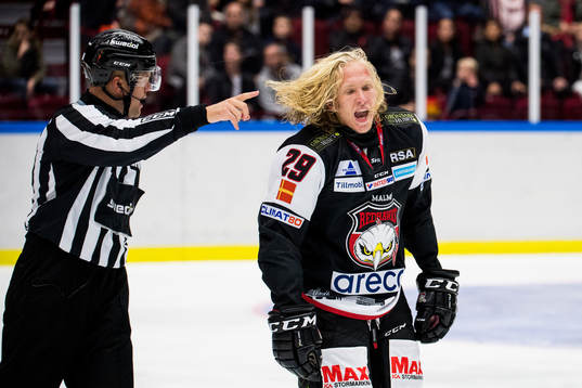 Domare Ludvig Lundgren och Malmö Redhawks Marcus