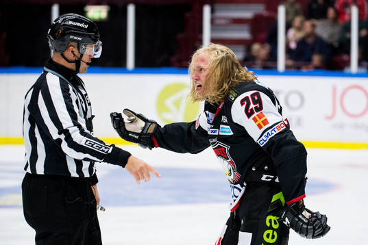 Domare Ludvig Lundgren och Malmö Redhawks Marcus