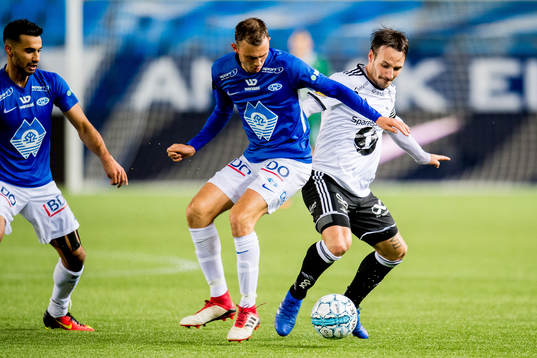Fredrik Aursnes of Molde and Mike Jensen of Rosenborg