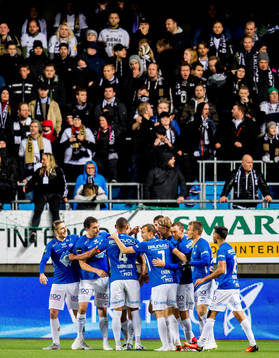 Vegard Forren of Molde celebrates with teammates