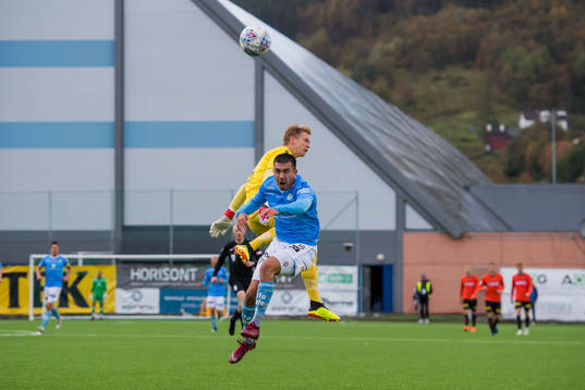 Goalkeeper Borger Thomas of Åsane and Sanel Kapidzic of