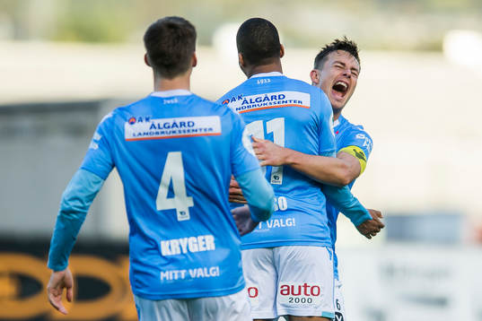 Erixon Danso of Sandnes Ulf celebrates with his teammate