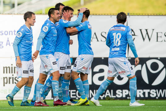 Axel Kryger of Sandnes Ulf celebrates with his teammates