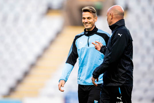 Head coach Uwe Rösler and Markus Rosenberg of Malmö FF