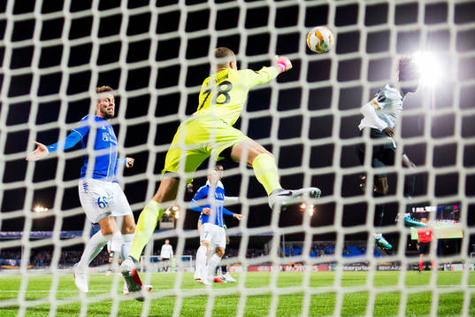 Patrick Mortensen, goalkeeper Aleksandr Vasyutin of