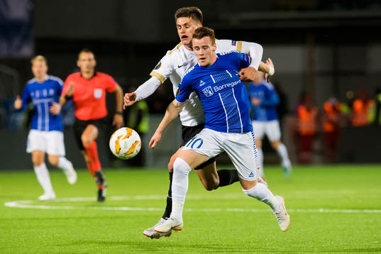 Joakim Maehle of Genk and Tobias Heintz of Sarpsborg 08