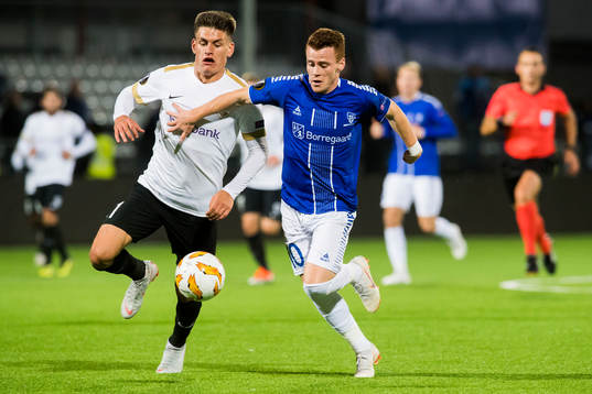 Joakim Maehle of Genk and Tobias Heintz of Sarpsborg 08