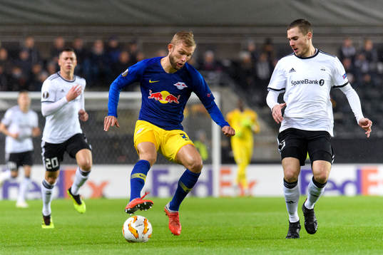 Konrad Laimer of RB Leipzig and Djordje Denic of Rosenborg