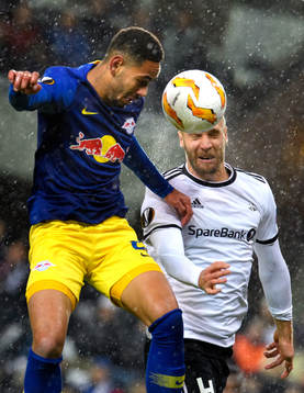 Matheus Cunha of RB Leipzig and Tore Reginiussen of