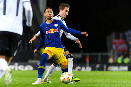 Matheus Cunha of RB Leipzig and Anders Konradsen of