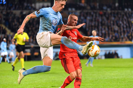 Sören Rieks of Malmö FF against Gökan Före of Besiktas