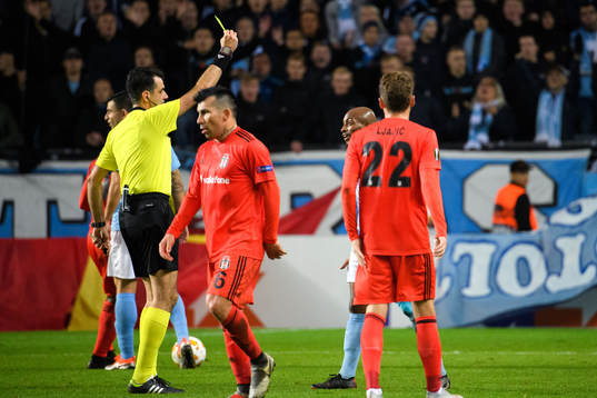 Arnór Ingvi Traustason of Malmö FF is shown the yellow