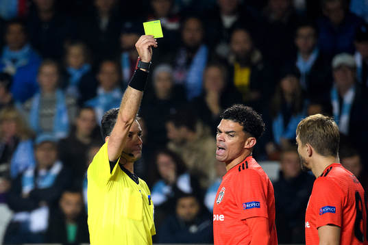 Pepe of Besiktas is shown the yellow card