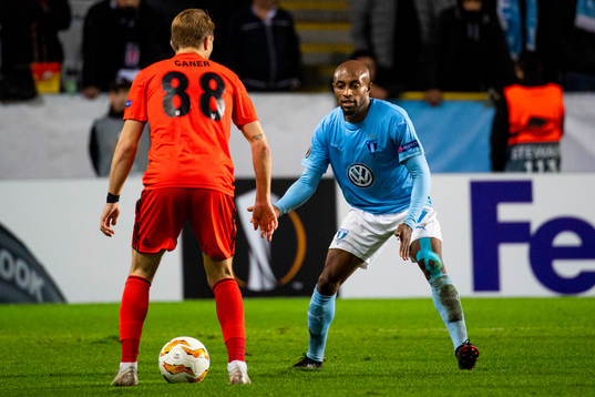 Caner Erkin of Besiktas and Fouad Bachirou of Malmö FF