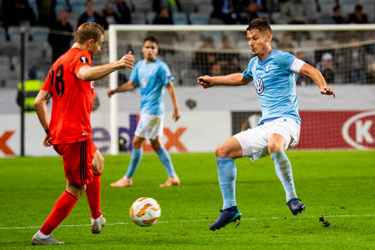 Caner Erkin of Besiktas and Markus Rosenberg of Malmö FF