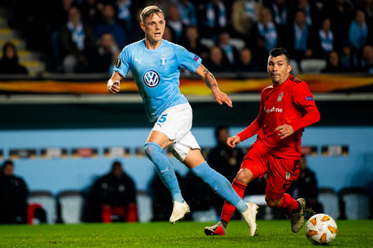 Sören Rieks of Malmö FF and Gary Alexis Medel Soto of