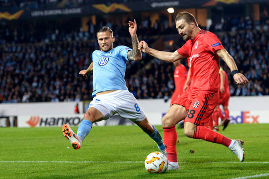 Arnór Ingvi Traustason of Malmö FF and Caner Erkin of
