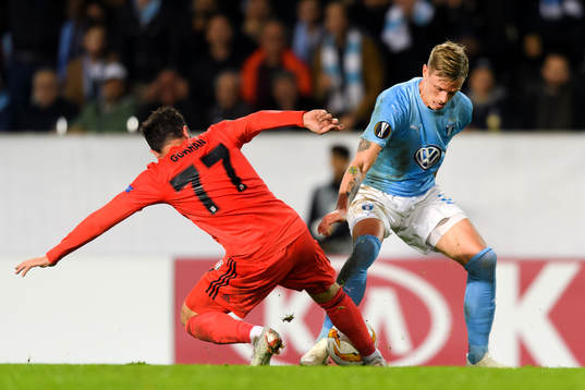 Gökhan Gönül of of Besiktas and Sören Rieks of Malmö FF