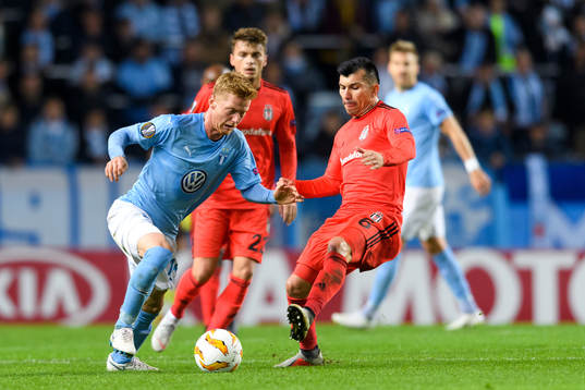 Anders Christiansen of Malmö FF and Gary Alexis Medel Soto