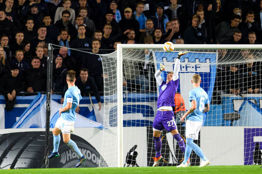 goalkeeper Johan Dahlin saves the ball