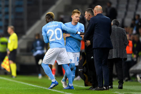Anders Christiansen leaves the pitch and Bonke Innocent of