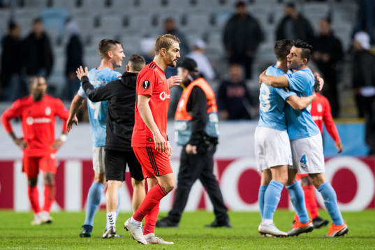 Caner Erkin of Besiktas looks dejected