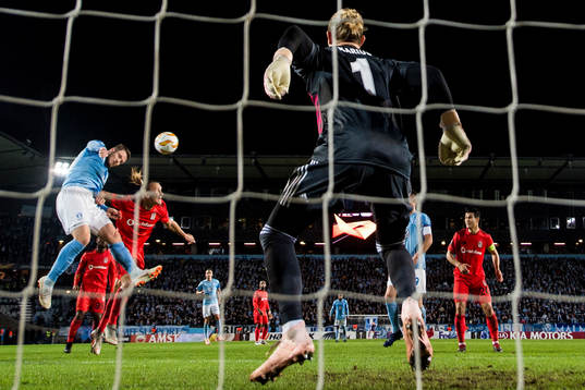 Lasse Nielsen of Malmö FF in against Adem Ljajic of