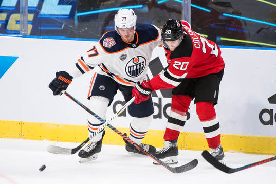 Oscar Klefbom of the Edmonton Oilers and Blake Coleman of