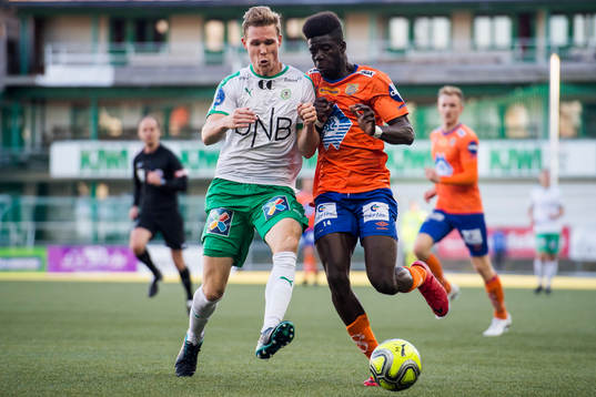 Jacob Egeris of HamKam and Pape Habib Gueye of Aalesund