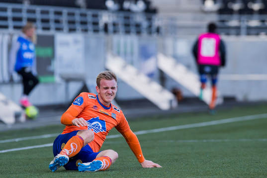 Torbjørn Agdestein of Aalesund reacts with an injury