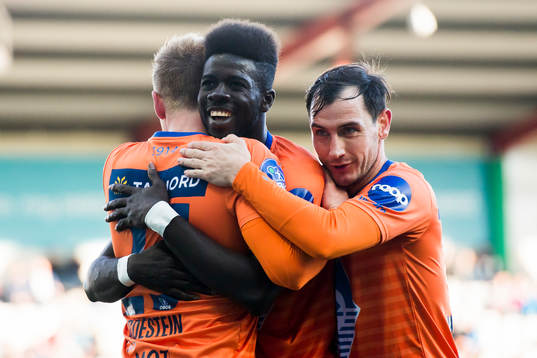 Pape Habib Gueye of Aalesund celebrates with his teammates