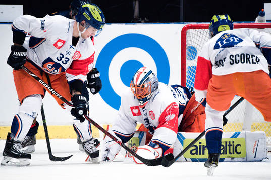 Veli-Matti Vittasmaki and Goalkeeper Nicklas Bäckström of