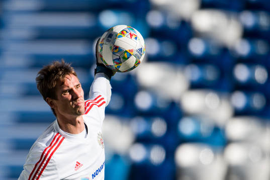 Goalkeeper Anton Sjunin of Russia