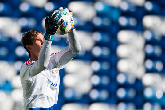 Goalkeeper Anton Sjunin of Russia