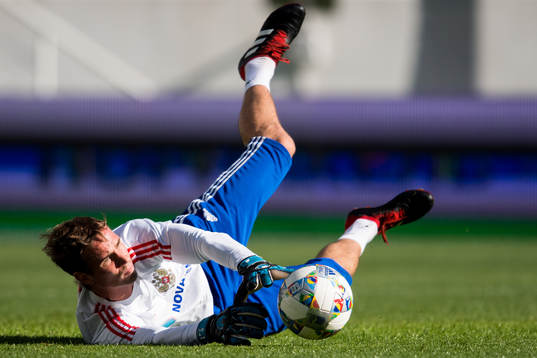 Goalkeeper Anton Sjunin of Russia