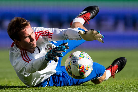 Goalkeeper Anton Sjunin of Russia