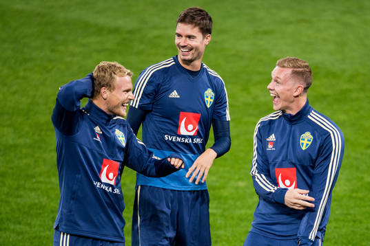 Oscar Hiljemark, Mikael Lustig and Emil Krafth of Sweden