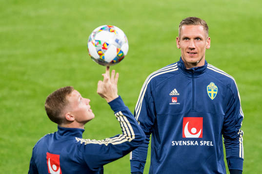 Emil Krafth and goalkeeper Robin Olsen of Sweden