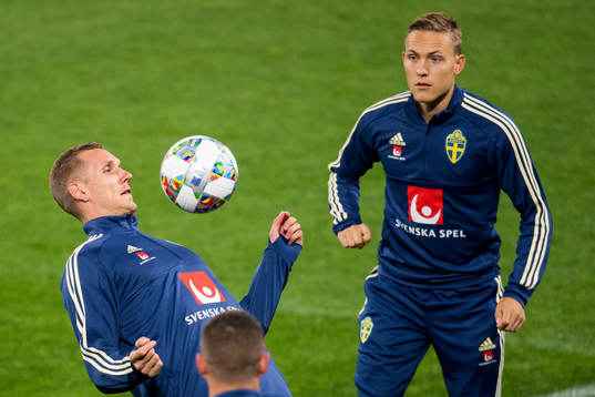 Goalkeeper Robin Olsen and Ludwig Augustinsson of Sweden