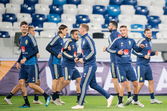 Mikael Lustig, Emil Krafth and Kristoffer Peterson of Sweden