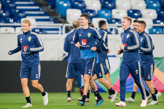 Oscar Hiljemark, Mikael Lustig and Emil Krafth of Sweden