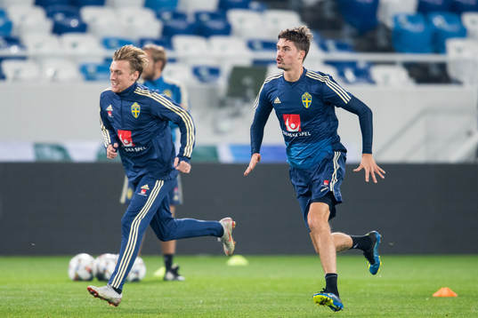 Emil Forsberg and Mikael Lustig of Sweden