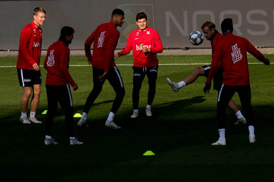 Sigurd Rosted and Tarik Elyounoussi of Norway