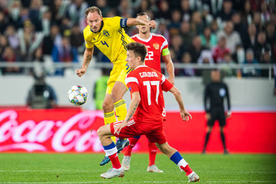 Andreas Granqvist of Sweden and Aleksandr Golovin of Russia
