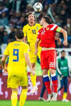 Gustav Svensson of Sweden and Artem Dzyuba of Russia